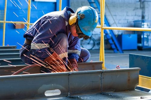 Construction worker in a blue hardhat
