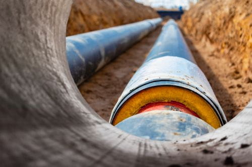 Heat network pipes through a tunnel