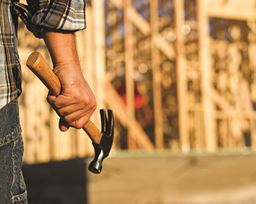 Construction worker holding a hammer