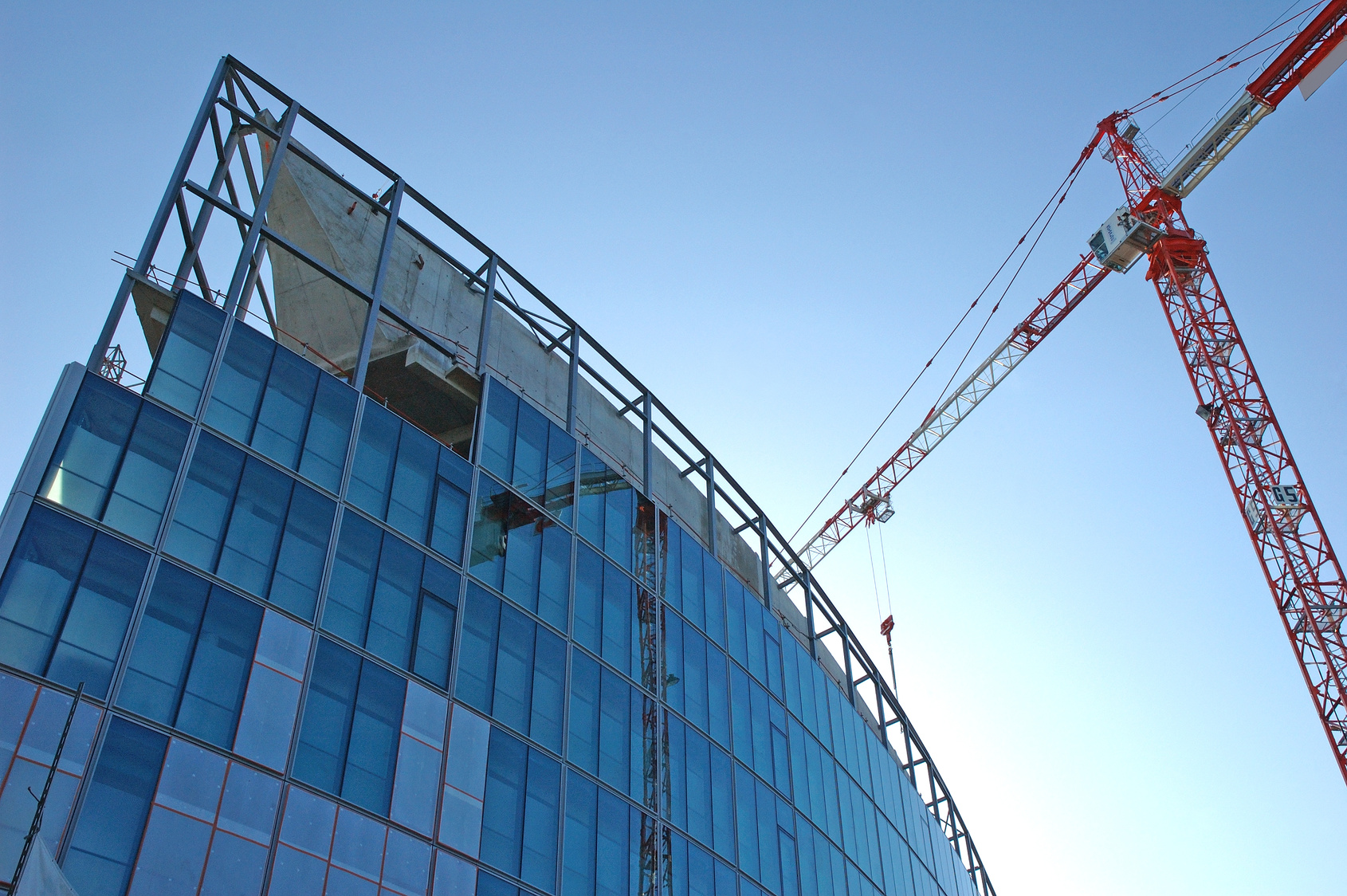 building with crane in front