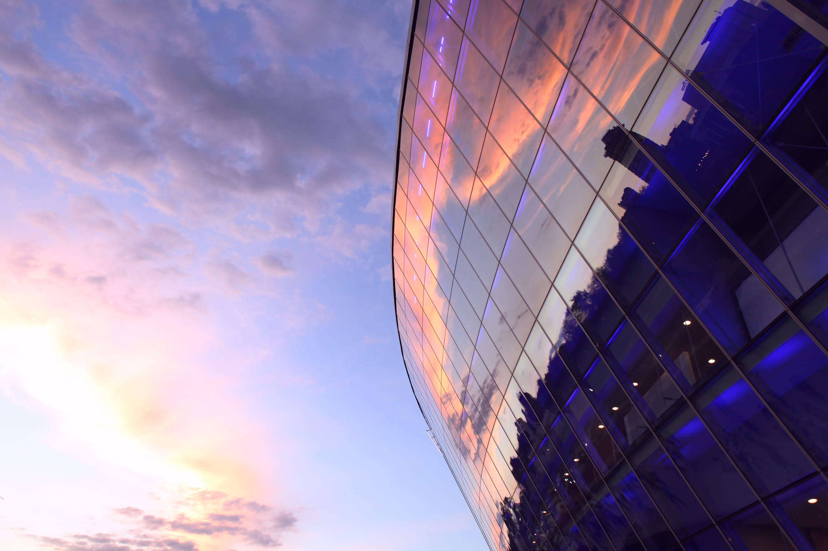 building reflection against the sunset