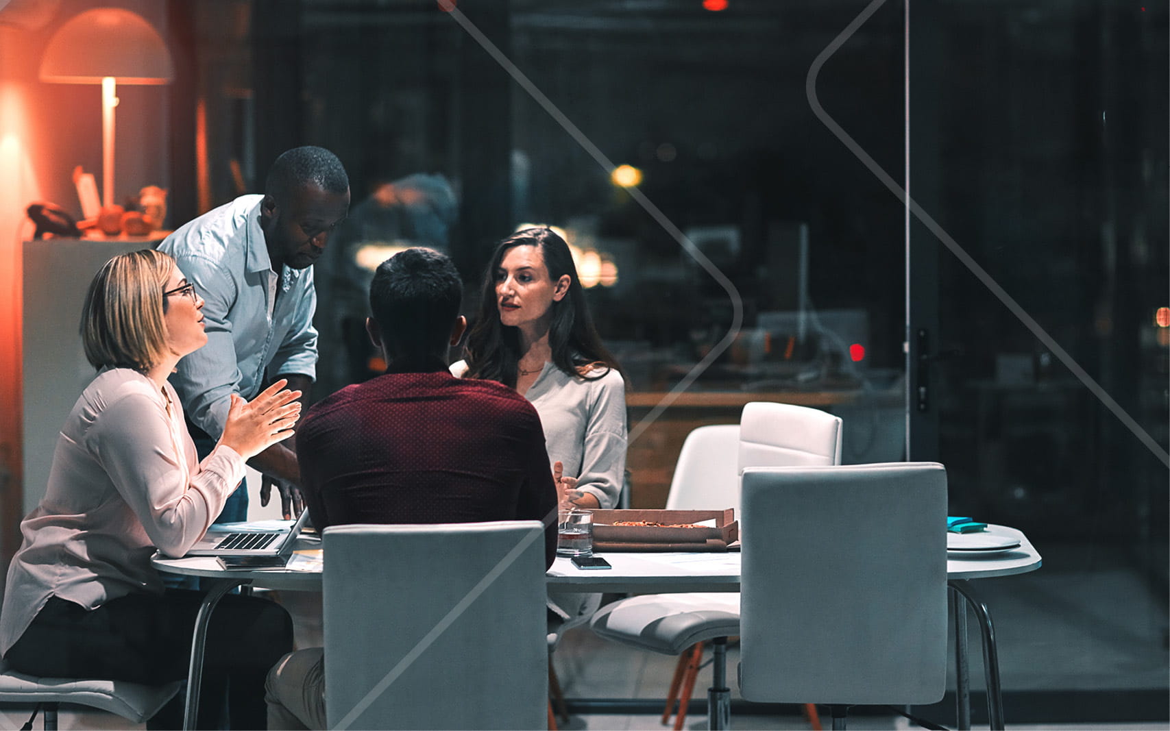 A group of people gathered around a table