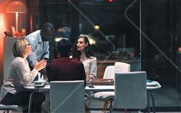 A group of people gathered around a table