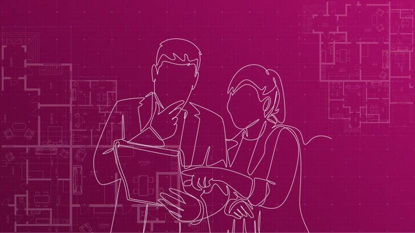 Two people look at paperwork