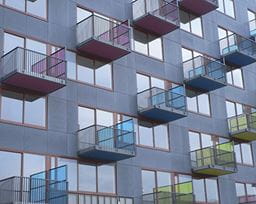 Colourful balconies outside a block of flats